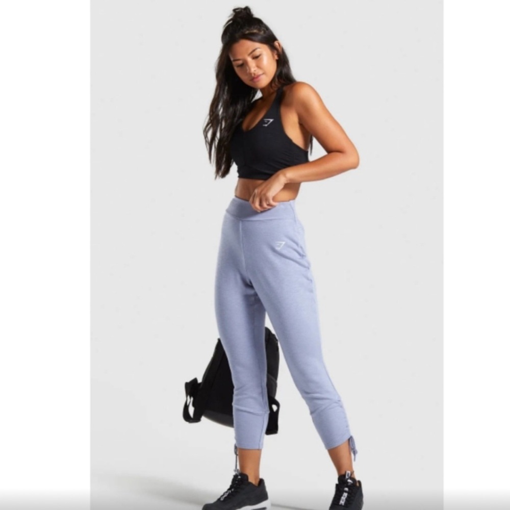 Gymshark Blue Track Pants with High Waist and Form-Fitting Design